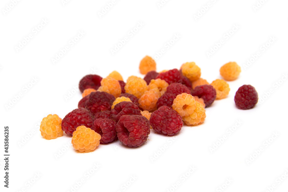 heap of ripe raspberries with leaves heap of ripe raspberries with leaves