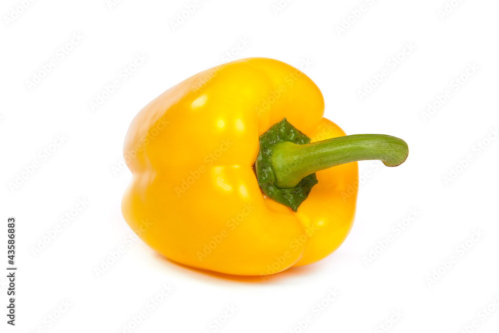 A yellow bell sweet pepper isolated on white A yellow bell sweet pepper isolated on white
