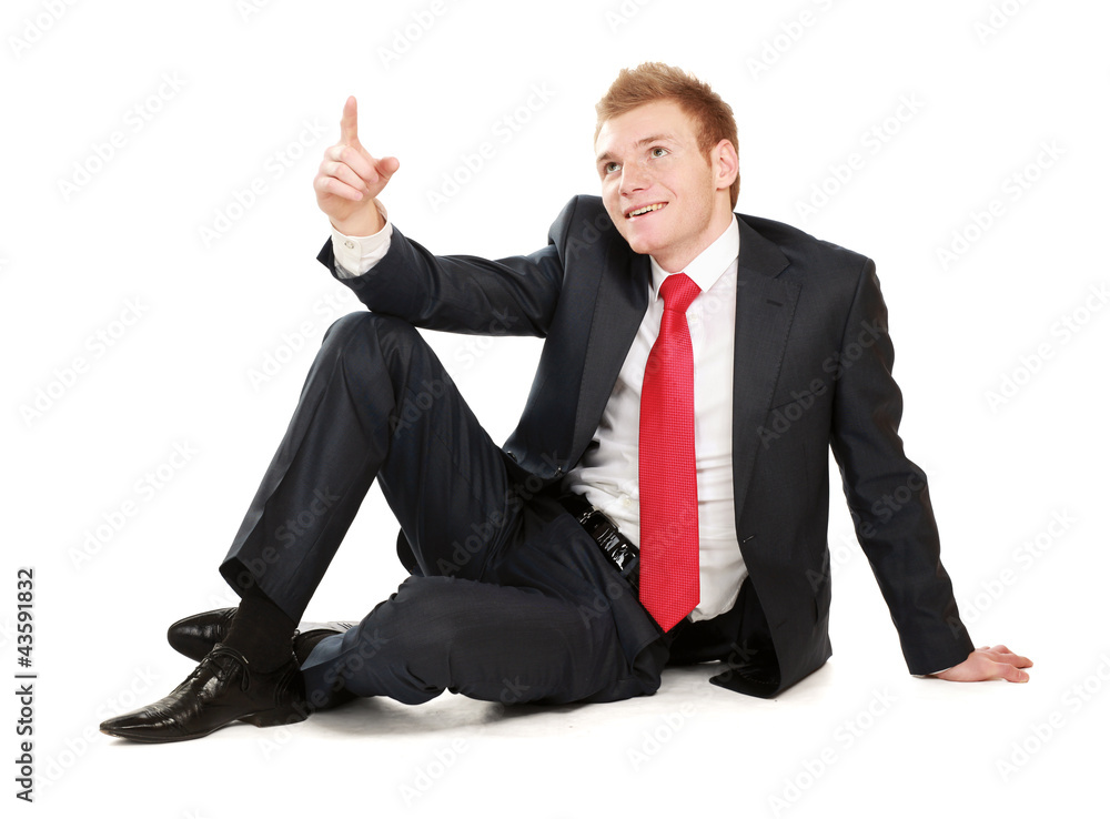 Relaxed mature business man sitting on the floor Relaxed mature business man sitting on the floor