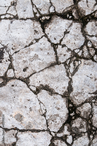 cracked concrete wall on ground