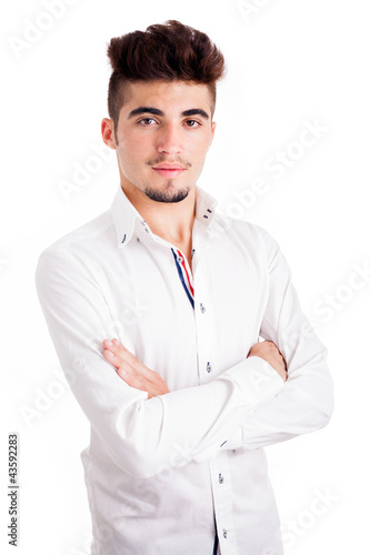 young casual man portrait with folded arms, isolated on white © cristovao31