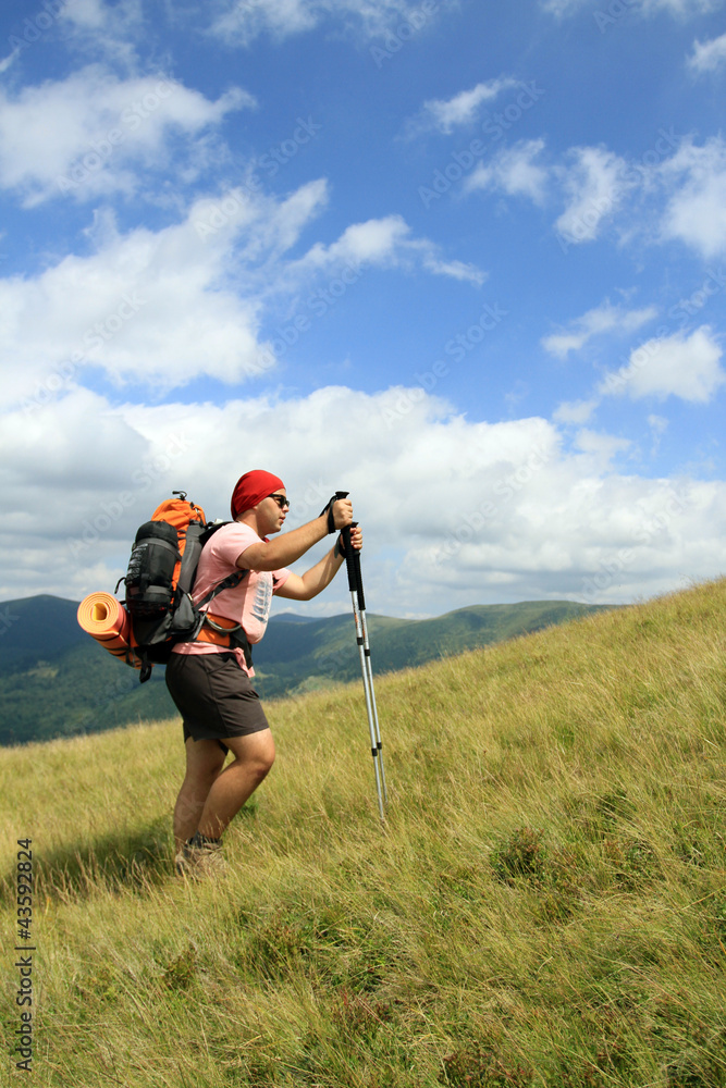 Hike in the mountains during the summer. Hike in the mountains during the summer.