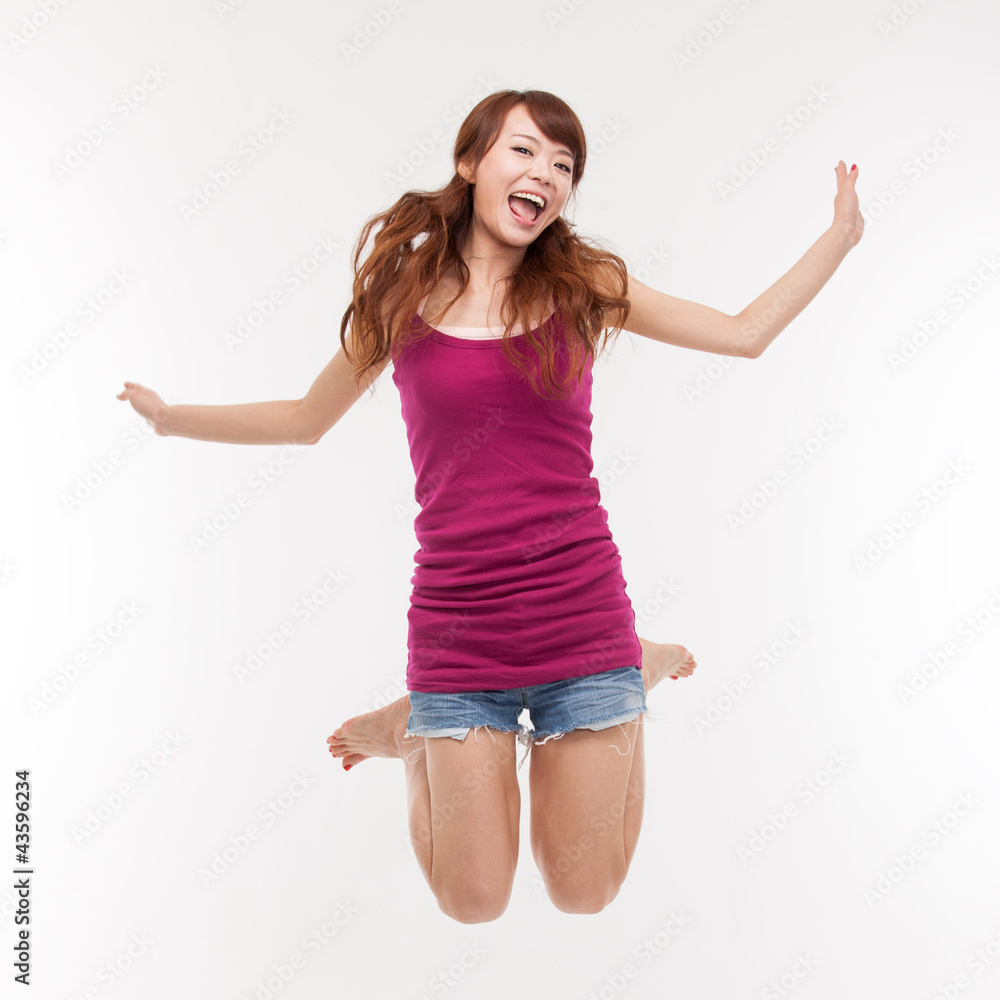 Jumping happy asian woman Jumping happy asian woman