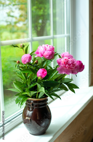 vase with peonies