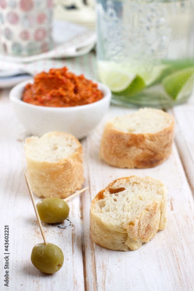 Baked peppers sauce and french baguette bread Baked peppers sauce and french baguette bread