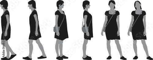 Walking young woman in dress