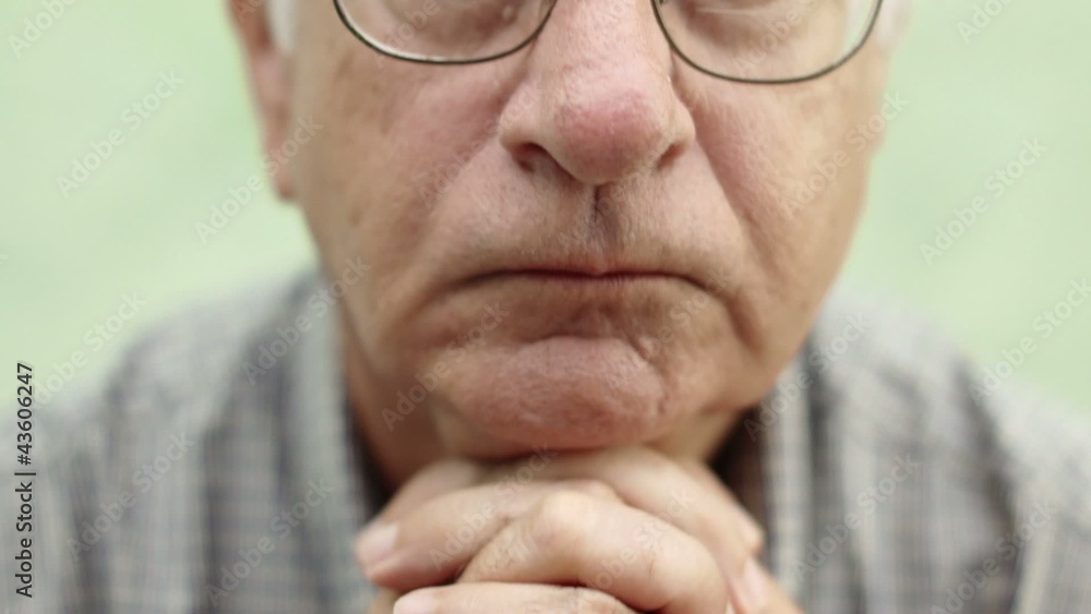 Portrait of serious and sad caucasian old man with glasses Portrait of serious and sad caucasian old man with glasses