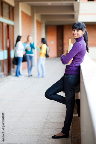 pretty young female college student full length portrait