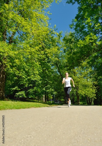 Young beautiful woman jogging