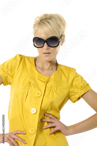 Close up fashion model wearing the modern sunglasses.
