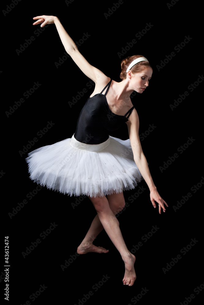 Young beautiful dancer posing on a studio Young beautiful dancer posing on a studio