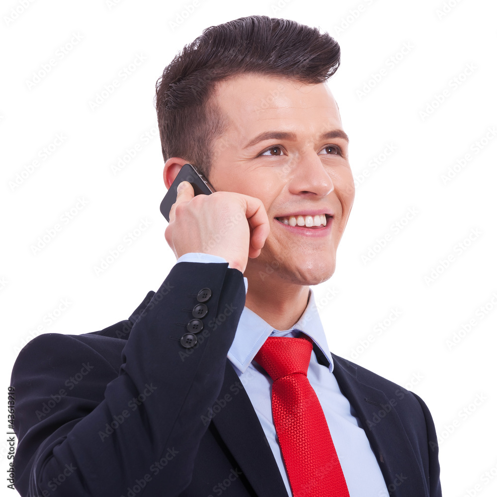 Naklejka premium business man talking on the mobile phone