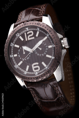 Luxury mens watch on black background