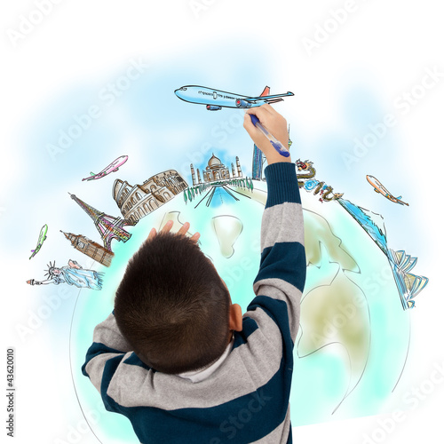 boy drawing the dream travel around the world in a whiteboard