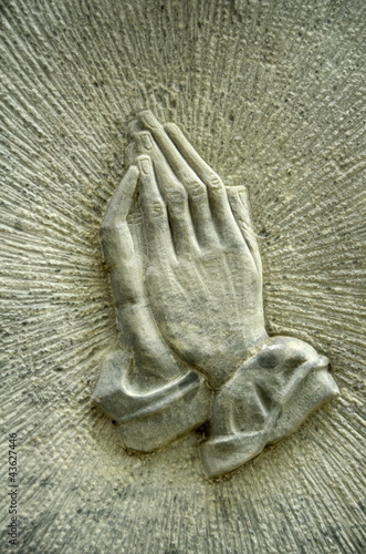 Christian Image Of Jesus' Praying Hands On A Gravestone