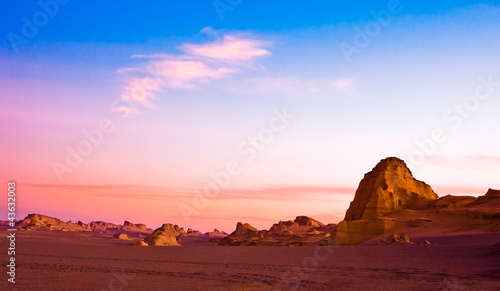 Beautiful sunset of sandy hills in a desert photo