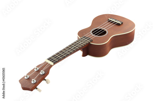 Small guitar (ukulele) focus neck on white background.