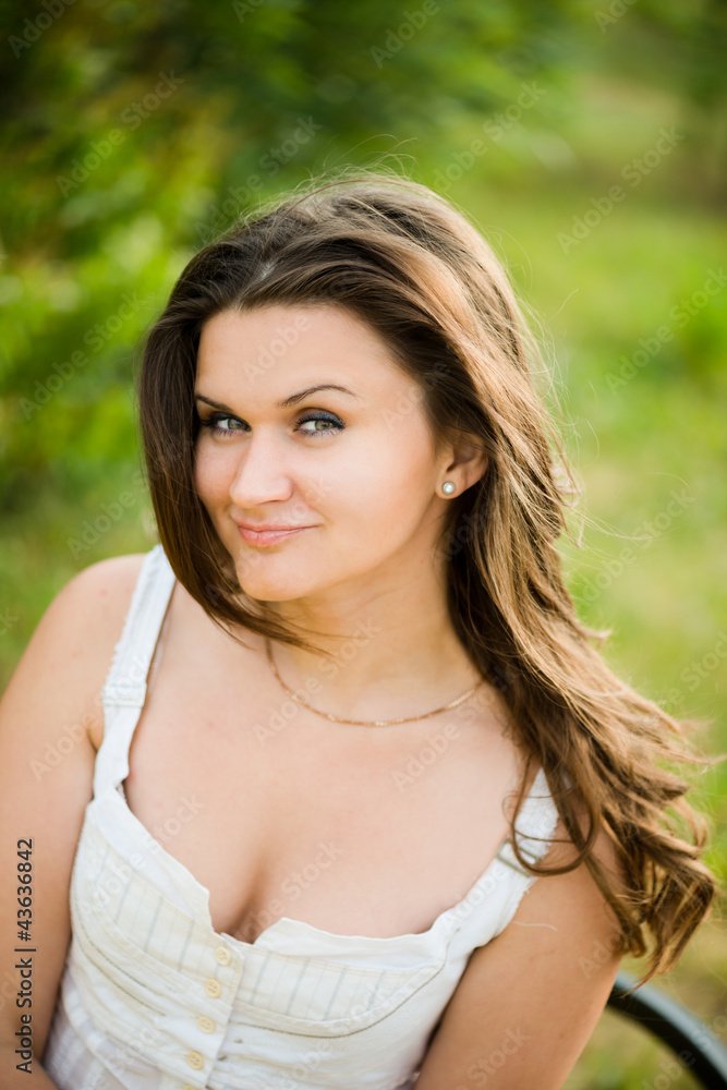 Portrait of a beautiful european woman smiling outdoors Portrait of a beautiful european woman smiling outdoors
