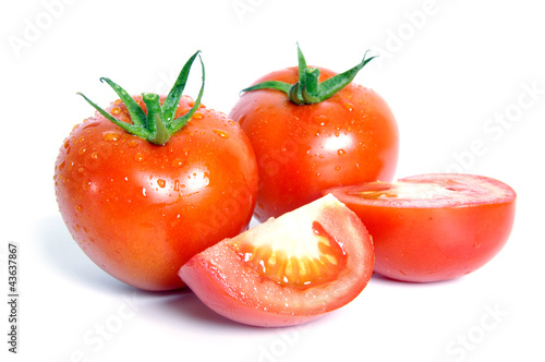 Tomatoes with water drops on the white