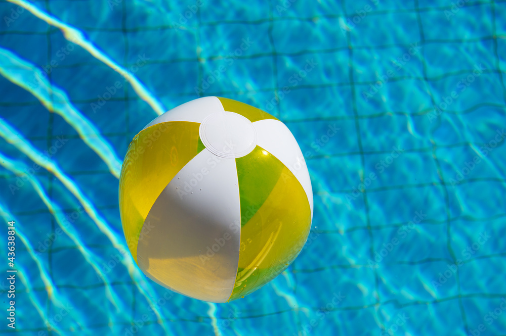 Inflatable beach ball in water