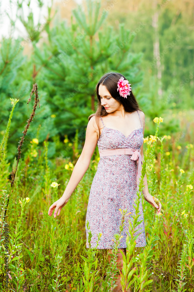 beautiful girl in a field of flowers beautiful girl in a field of flowers