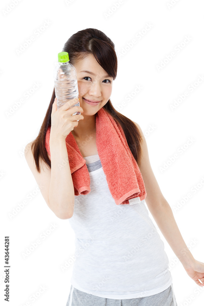 Beautiful young woman drinking water at workout Beautiful young woman drinking water at workout