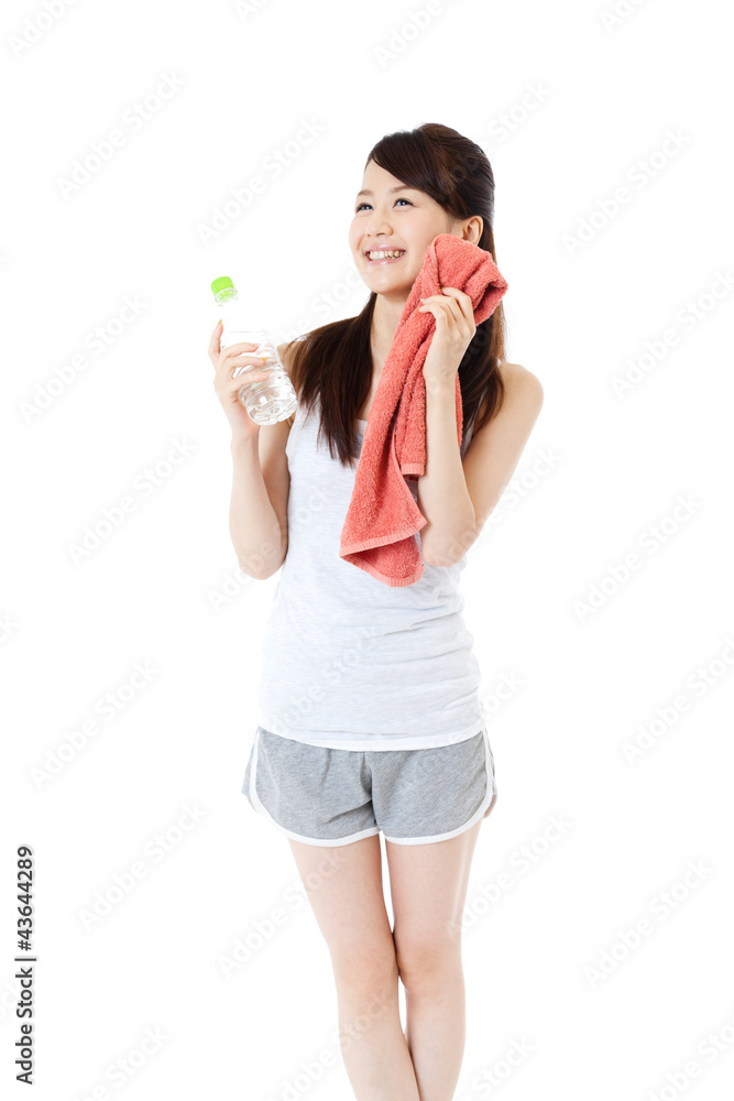 Beautiful young woman drinking water at workout Beautiful young woman drinking water at workout