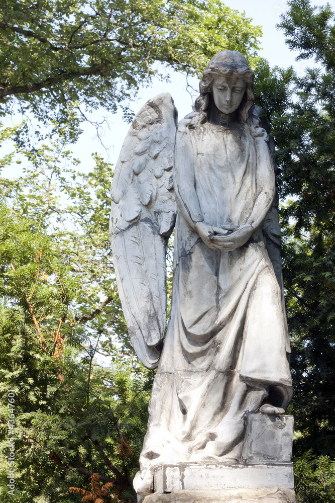 Ancient angel on Warsaw cemetery