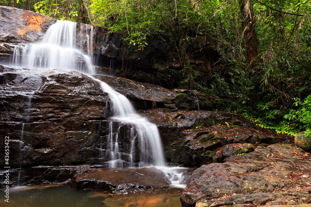 Fototapeta premium Waterfall in tropical forest, east of Thailand