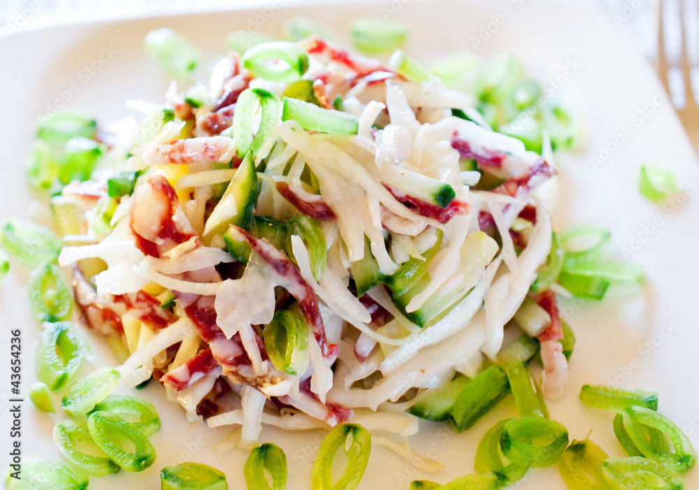 Salad with cabbage , sausage, cucumber and green peas Salad with cabbage , sausage, cucumber and green peas