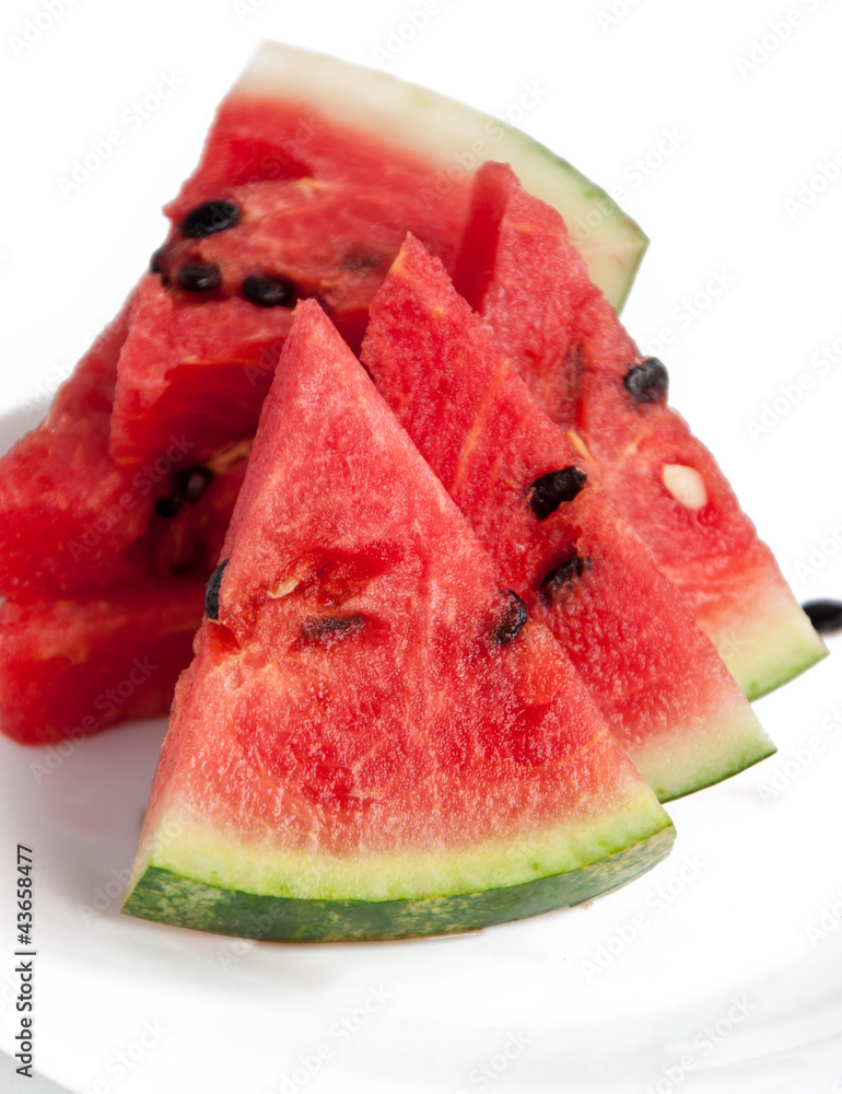 Slice of watermelon on a white background Slice of watermelon on a white background
