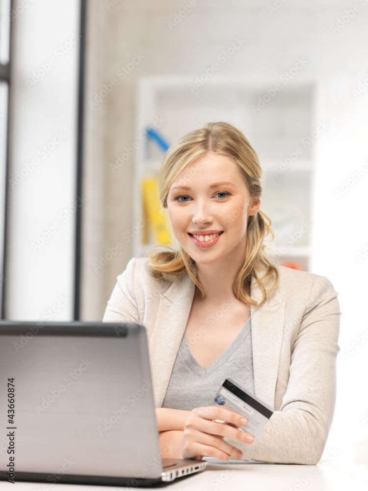 happy woman with laptop computer and credit card happy woman with laptop computer and credit card