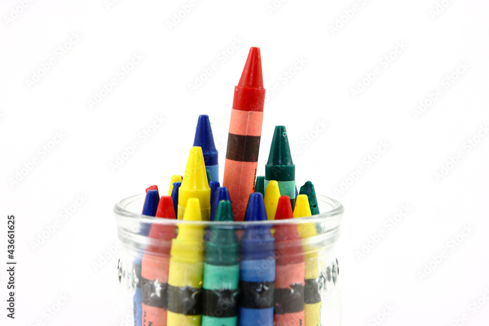 Obraz premium Assorted Colors Of Crayons In A Clear Jar