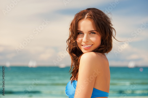 happy smiling woman on the beach