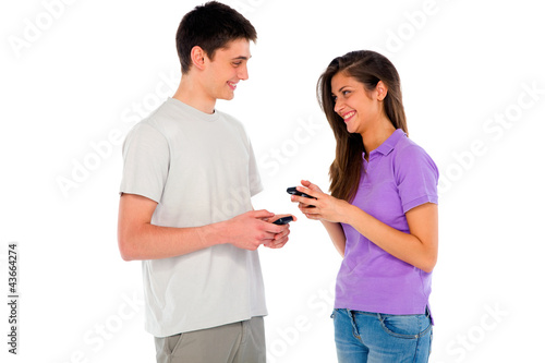 couple of teenage with smartphone