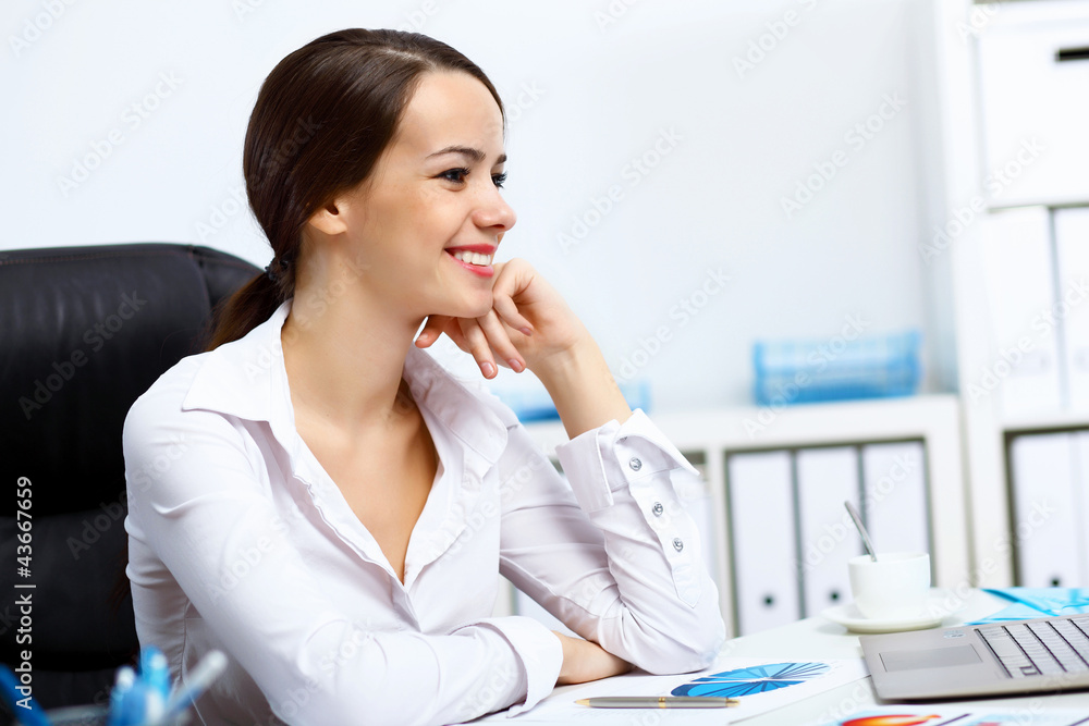 Young businesswoman in the office Young businesswoman in the office