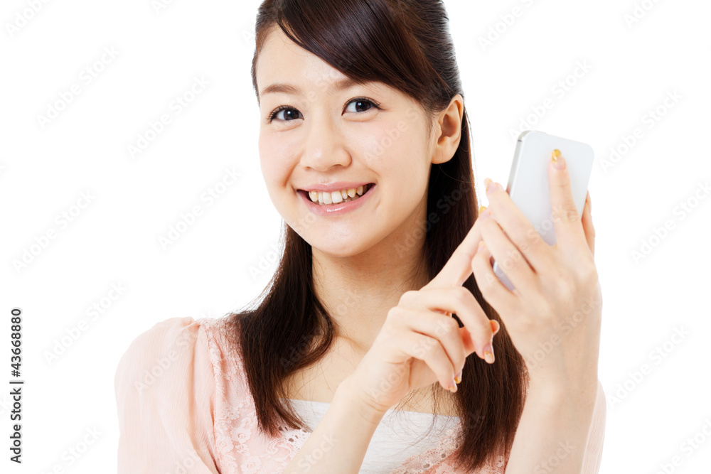 Beautiful young woman using a mobile phone. Portrait of asian. Beautiful young woman using a mobile phone. Portrait of asian.