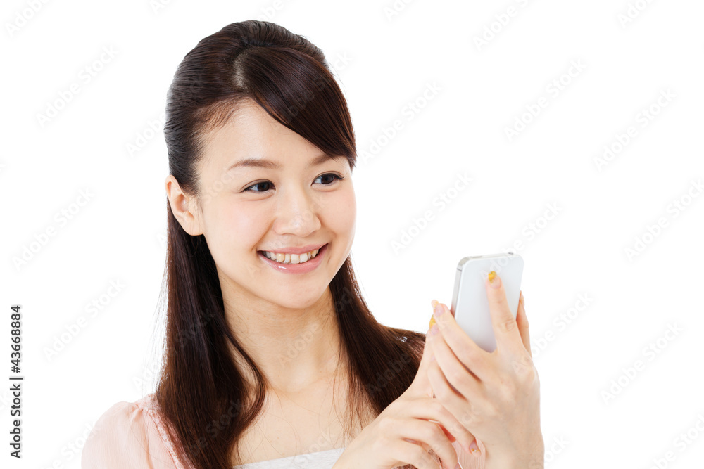 Beautiful young woman using a mobile phone. Portrait of asian. Beautiful young woman using a mobile phone. Portrait of asian.