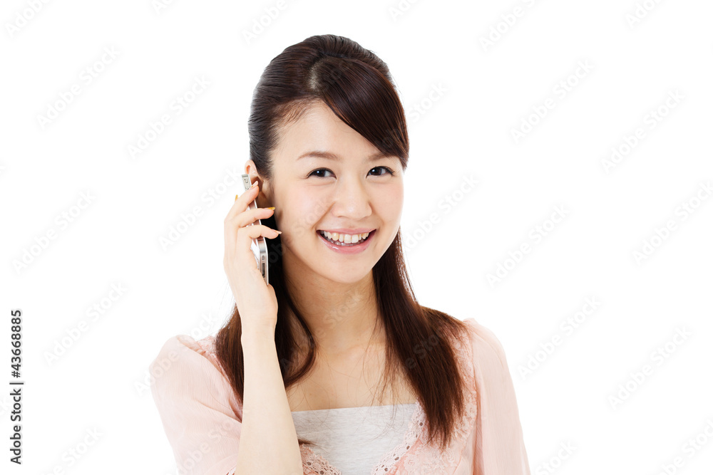 Beautiful young woman using a mobile phone. Portrait of asian. Beautiful young woman using a mobile phone. Portrait of asian.