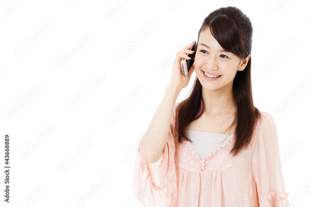 Beautiful young woman using a mobile phone. Portrait of asian. Beautiful young woman using a mobile phone. Portrait of asian.