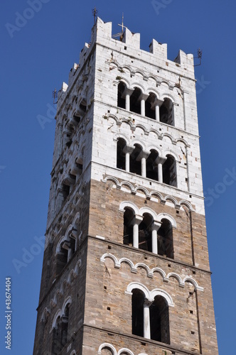 A tower with triforiums in Lucca Tuscany Italy photo