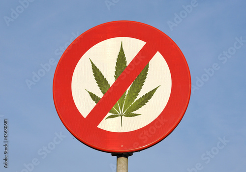 Red and white reflective prohibition sign with canabis leaf