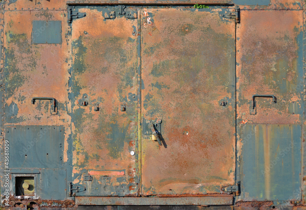 Rusty doors in metal container Rusty doors in metal container