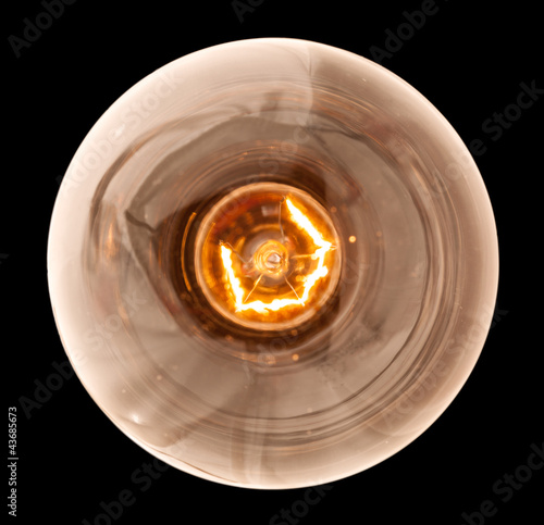 Incandescent light bulb lit from above
