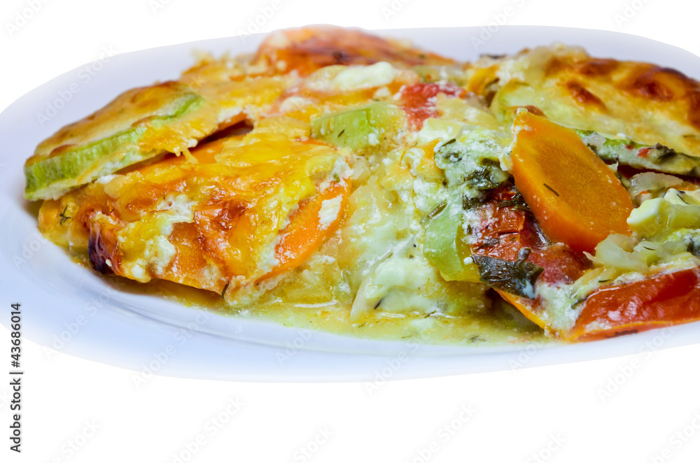 Roasted vegetables with sauce on the plate Roasted vegetables with sauce on the plate