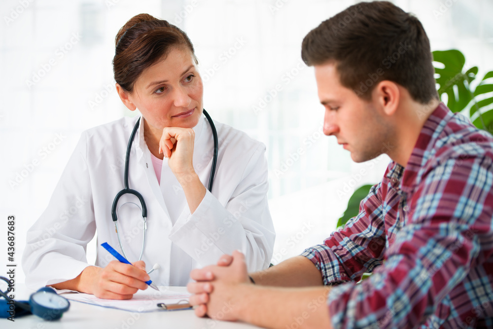 doctor with male patient