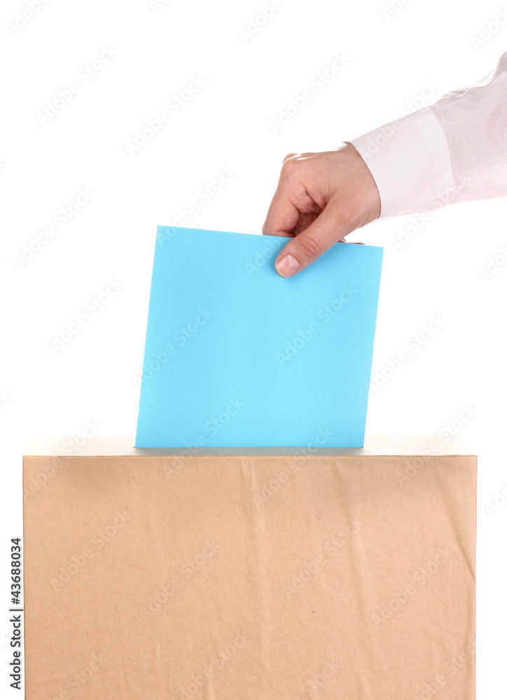 Fototapeta premium Hand with voting ballot and box isolated on white