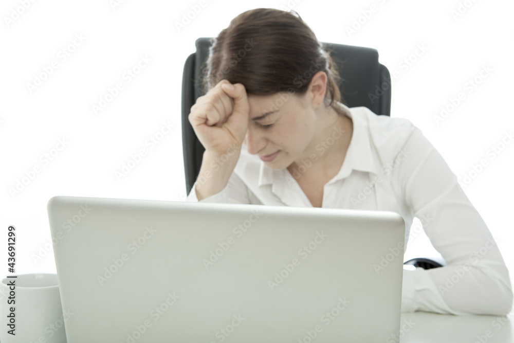 young brunette business woman is frustated behind her laptop young brunette business woman is frustated behind her laptop