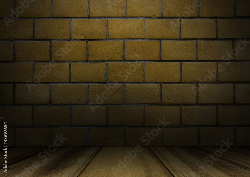 Brick wall with wood floor interior