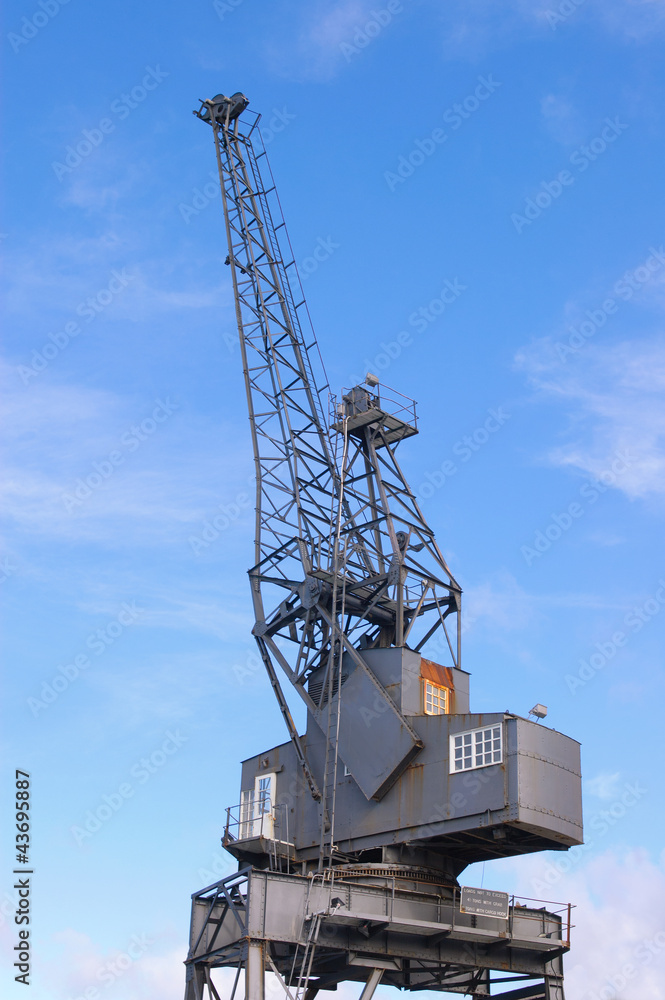 Dockside crane for lifting containers in and out of commercial cargo ships Dockside crane for lifting containers in and out of commercial cargo ships